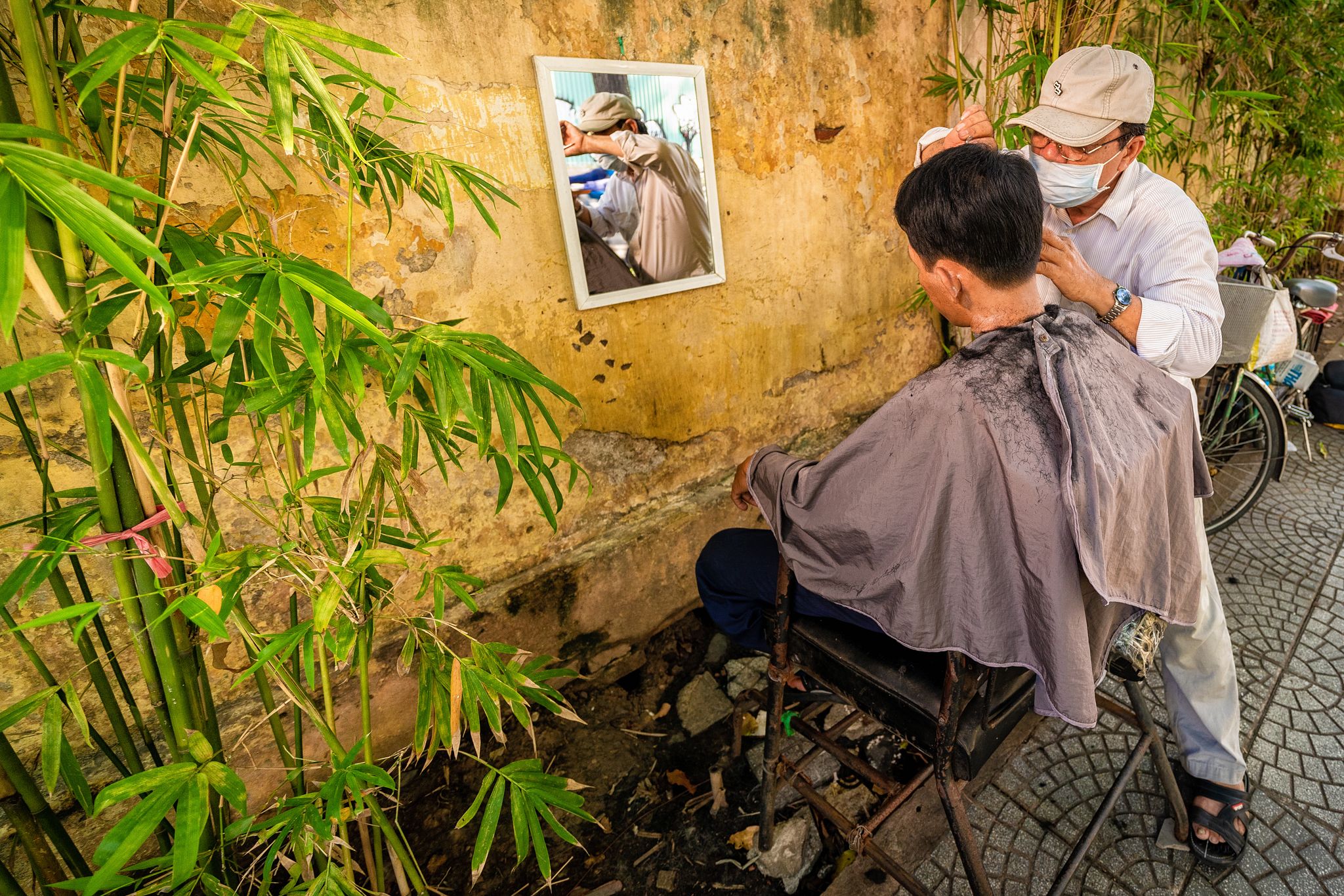 Coiffeur de rue à Hanoï