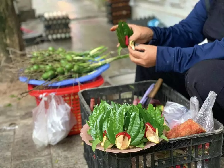 Chique de bétel et la laque des dents au Vietnam